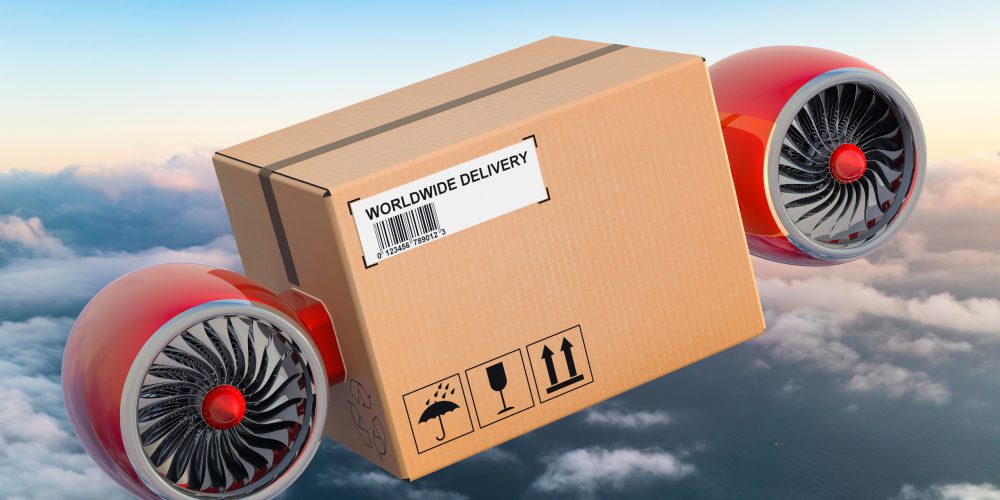 parcel-with-jet-engines-flying-in-the-sky-fast-delivery-concept-3d-picture-id1185713907